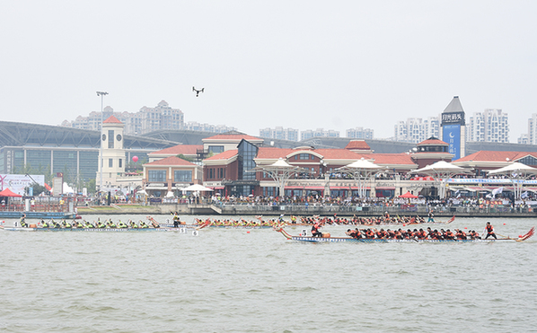 金鸡湖端午龙舟赛开赛 外籍参赛人士增16%